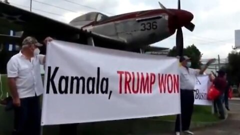 Guatemalans Fly ‘Trump Won’ Signs as Kamala Harris Arrives for Visit ‘Go Home!’