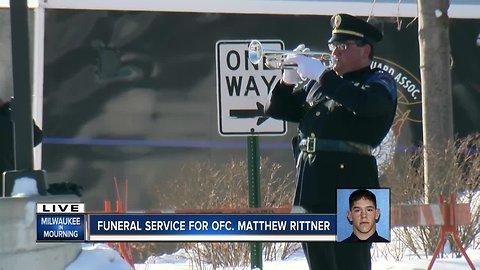 The gun salute and Taps at Matthew Rittner's funeral