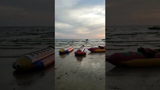 Sunset and Playtime at Chao Lao Beach, Thailand