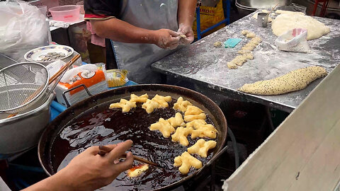 Thai Donut Making at Morning Food Market in Bangkok Thailand