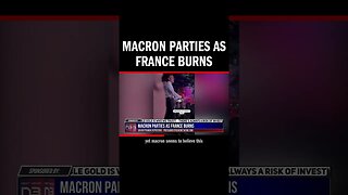 Macron Parties as France Burns