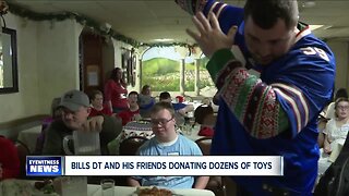 Harrison Phillips and his 'Playmaker Pups' donate dozens of toys