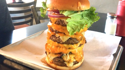 KGUN9 attempts the OMFG Burger Challenge