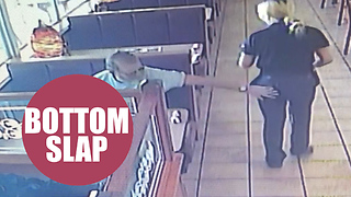 Restaurant customer caught on CCTV slapping waitress on backside