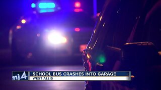 School bus with children on board crashes into a West Allis garage