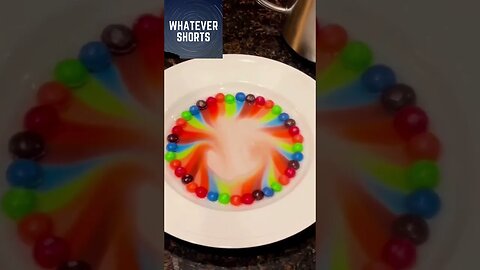 Candies being dissolved by hot water and they bleed colour's #shorts #colour #candy #rainbow