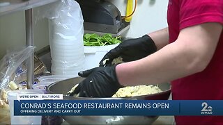 Conrad's Seafood restaurant remains open, offering delivery and carry out