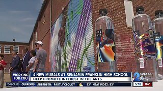 Four murals at Benjamin Franklin High School