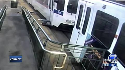 RTD light rail video shows man surviving after being dragged by train