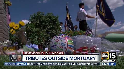 McCain tributes grow outside of mortuary