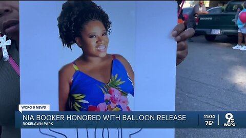 Dozens release balloons for Nia Booker, the pregnant mother shot and killed in Avondale