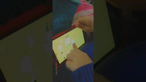 Baby boy learns how to play with his IPAD- Drawing a baby goat