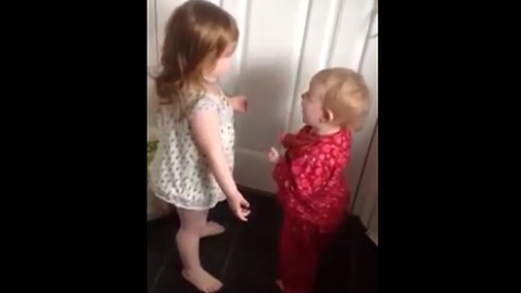 Baby Siblings Argue About Laundry Room Dryer