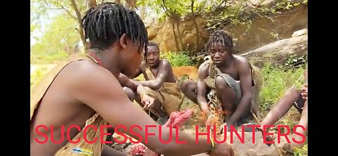 SUCCESSFUL HUNTERS,THEY ARE OWEN COOKING AND EATING, TREADDITIONAL.