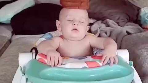 Parents Stack Food On Top Of Sleeping Baby's Head