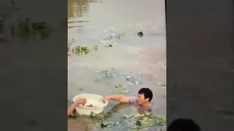 Villagers Fish Food from the Water after the Flood.