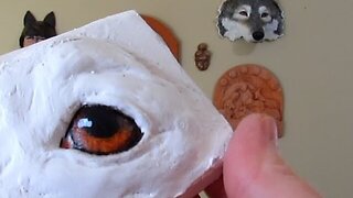 Painting Dog Eyes on Paper Mache Sculpture