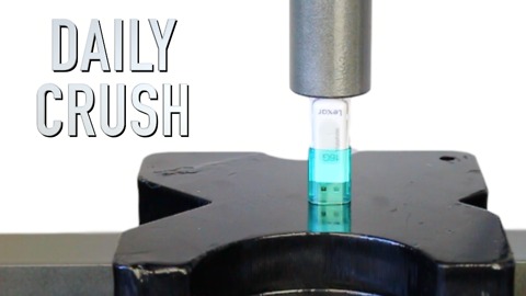 Crushing a USB hard drive with a hydraulic press