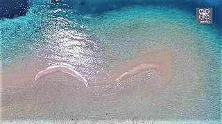 Epic Drone Footage Of Twin Islands In Greece While Both Sink And Emerge