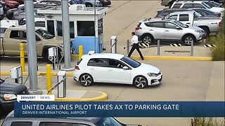 United Airlines pilot caught on surveillance video taking an axe to a parking gate at DIA