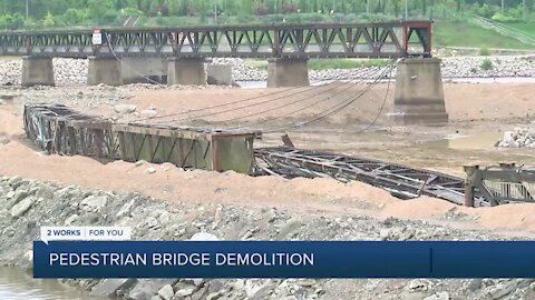 Historic Arkansas River pedestrian bridge undergoes demolition