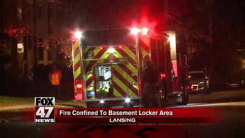 Fire confined to basement locker room in Lansing