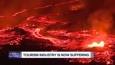 Workers plugging energy wells as lava from Kilauea flows nearby