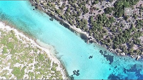 Drone footage captures incredible "blue lake" of Greece