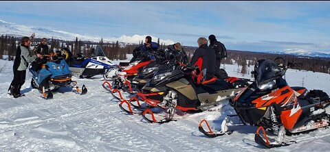 Snowmobiling Alaskan swamps