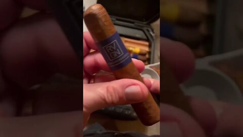 Cutting and toasting the RVGN from German Engineered Cigars.