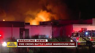 Firefighters battle large warehouse fire in Dover