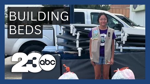 Girl Scout makes beds for shelter dogs