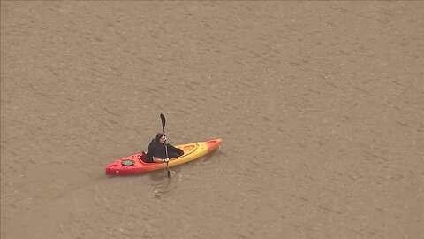 Kayakers enjoying stormy weather in Valley