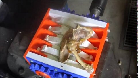 3D printed shredder shredding chicken bones