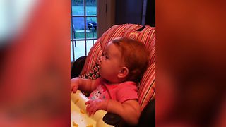 Baby Adorably Disagrees With Dad