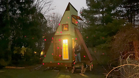 Big Guy In A Festive Tiny A-Frame Cabin House 2022