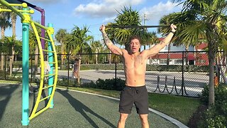 EXERCISE DEMO: WARMUP - BANDED OVERHEAD SQUAT