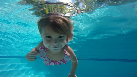 Two-Year-Old Swims In Pool All By Herself
