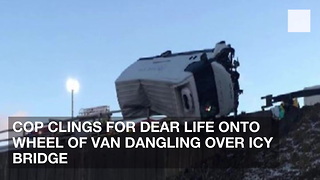 Cop Clings for Dear Life onto Wheel of Van Dangling Over Icy Bridge