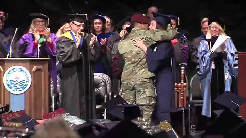 Army husband surprises wife on stage at Florida Atlantic University graduation