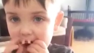 A Little Boy Takes His Grandma's False Teeth And Puts Them In His Mouth