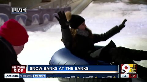 WCPO's Paola Suro takes a ride down giant hill at The Banks