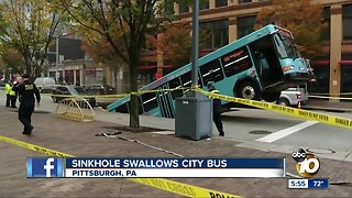 Pittsburgh sinkhole swallows city bus