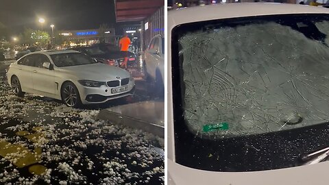 Extreme hailstorm absolutely destroys the windows on the car