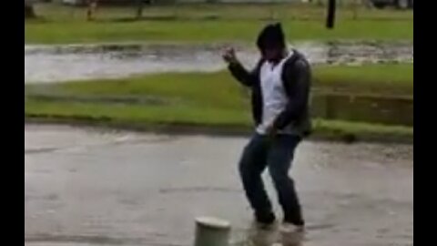 Man Makes Most Of Flooding By Taking To Street For Usher Parody