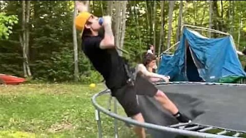 Trampoline jump ends in spectacular failure