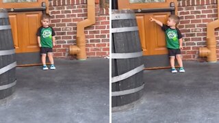 Little Boy Holds Door Open For Strangers
