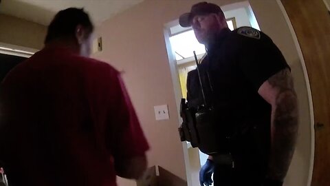 Bodycam footage of a man pulling out a knife as he was about to get arrested for a robbery warrant.