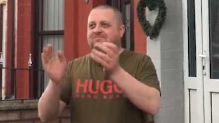 Man applauds his favorite delivery service