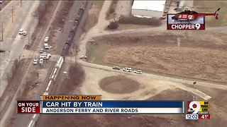 Car hit by train